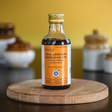 Load image into Gallery viewer, Arya Vaidya Sala Kottakkal Malatyadi Kera Tailam