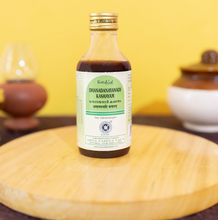 Load image into Gallery viewer, Arya Vaidya Sala Kottakkal Dhanadanayanadi Kashayam